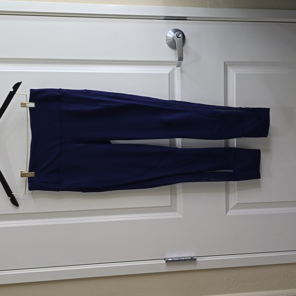 Lululemon Size 8 Navy‎ Blue Mesh Panel leggings with Reflective Strip
